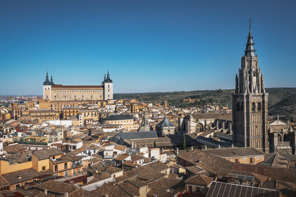Aerial view of Toledo city with Cathedral Tower and Alcazar - Toledo, Castila La Macha, Spain.