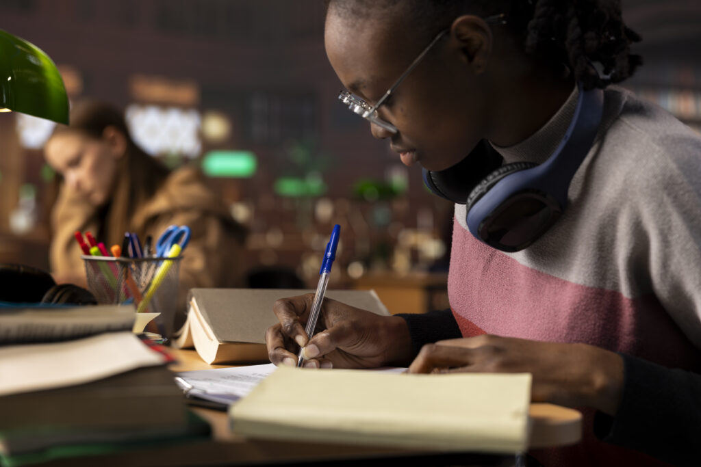 Student working hard for her graduation certificate.