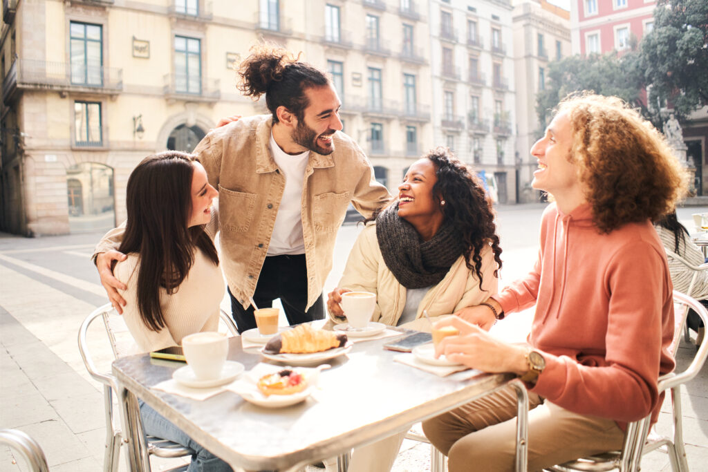 Photo of group of friends meet in the street.