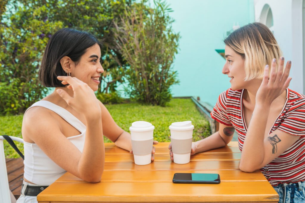 Photo of friends at a coffee shop.