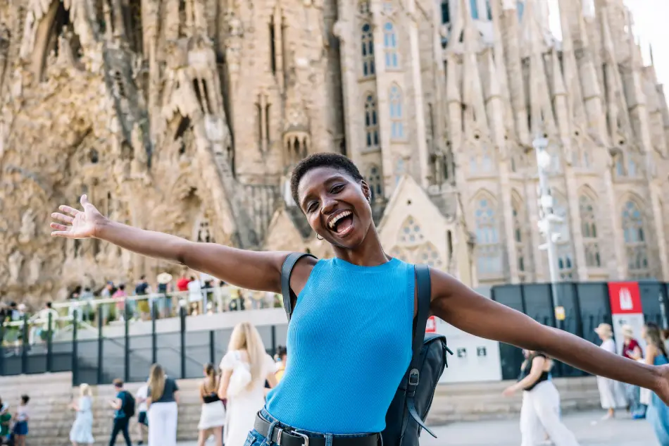 Woman posing in front of sagrada familia. Woman posing in front of sagrada familia.